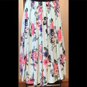 Beautiful teal skirt pladed design